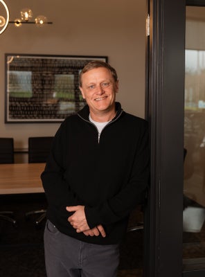 Portrait of Dusty Trost, Principal Broker